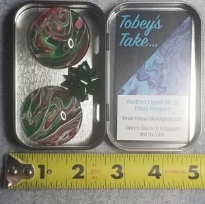 Original paint pouring magnets in gift tin.